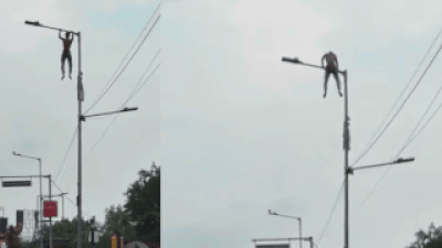 ‘Want to meet Suvendu-babu’: Bengal man climbs lamp post, performs pull-ups, stunts for 40 minutes | Kolkata News
